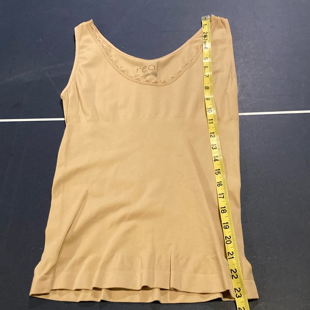 Cam saw to wear underneath period super stretchy lace vneck.
